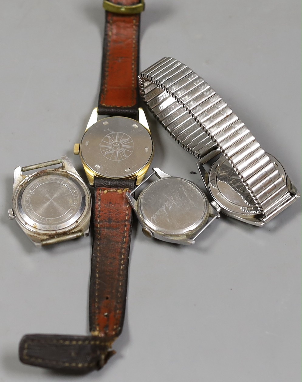 Two gentleman's Tissot Seastar steel or steel and gold plated wrist watches, including automatic and two other wristwatches, Timor and Sekonda